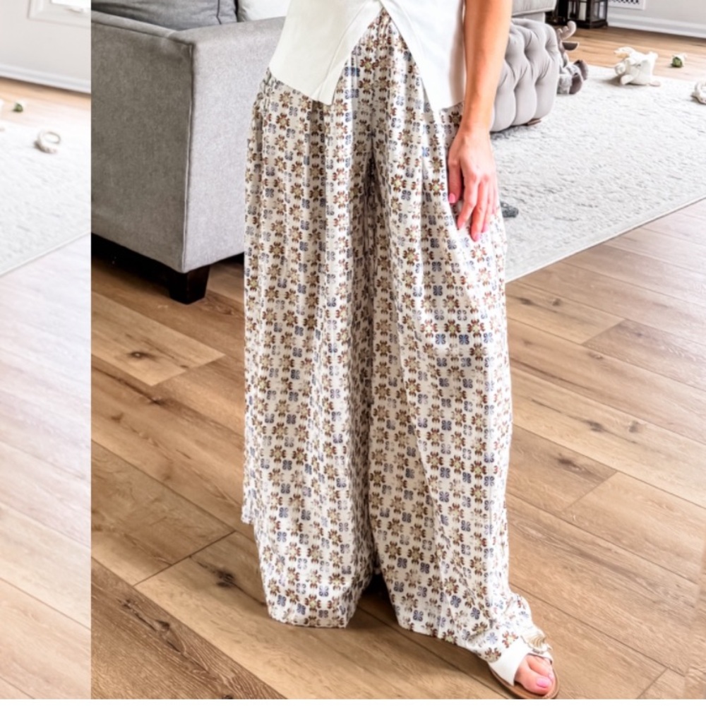 Multi color floral flowers. Wide leg pants. Flowy fabric.